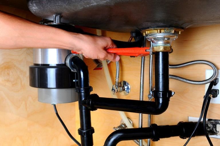 Garbage disposal repair vs replacement El Paso TX